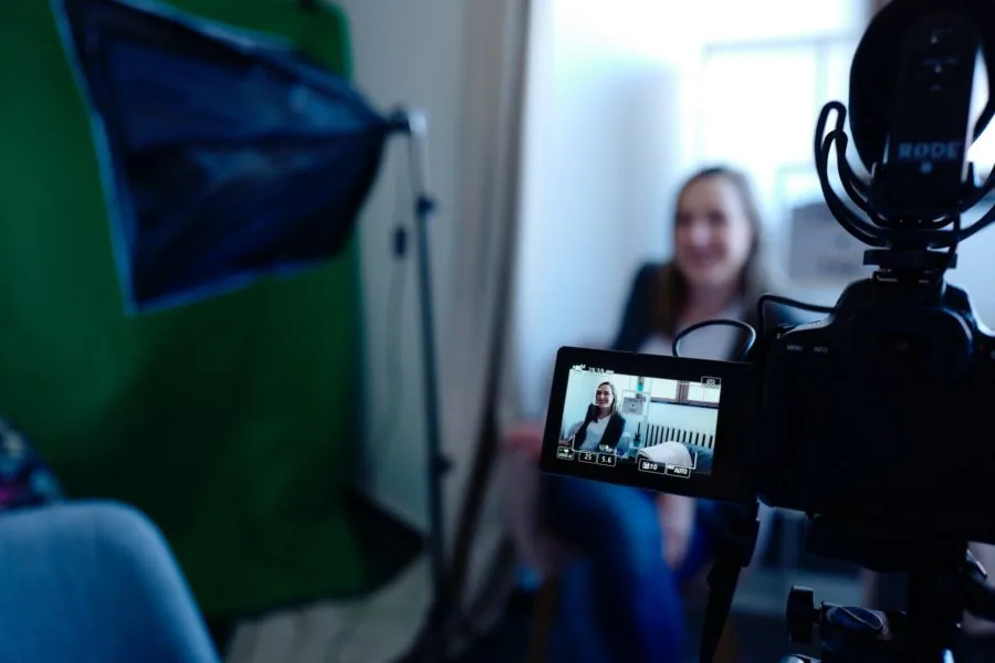 Woman recording a vlog instead of writing a blog.