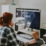 Woman exploring how to monitor site traffic to her company's website.