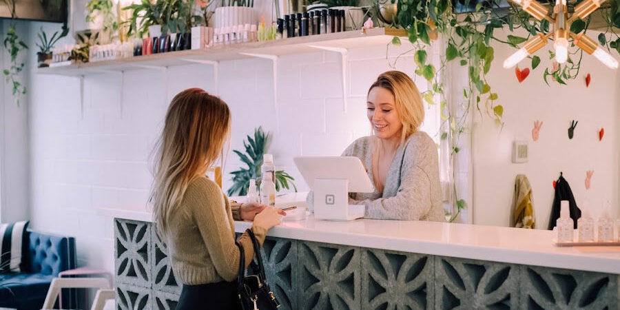 Woman visiting a salon after discovering it online.